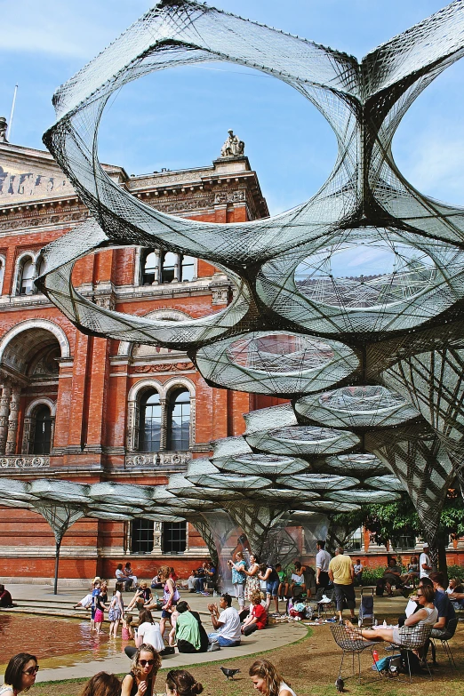 a sculpture with multiple squares of glass over it