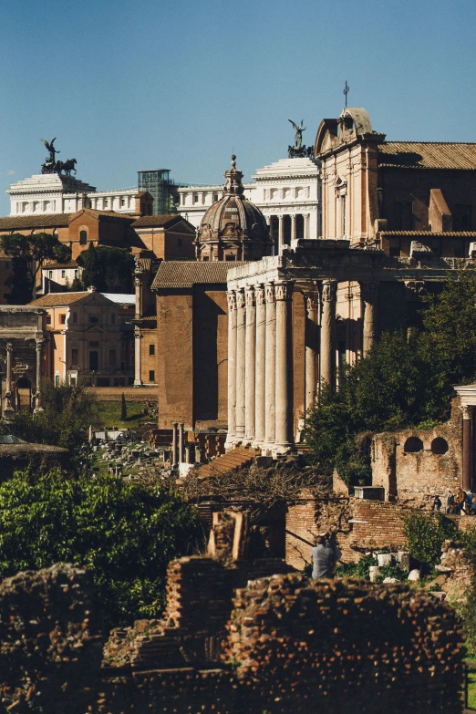 some very old ruins in the middle of a city