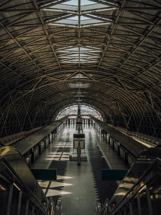 an image of a train station building with people inside