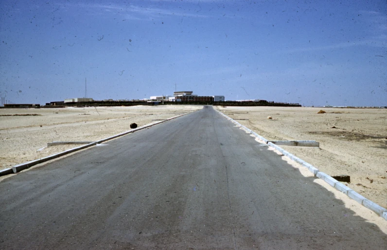 long empty road with no cars coming down it