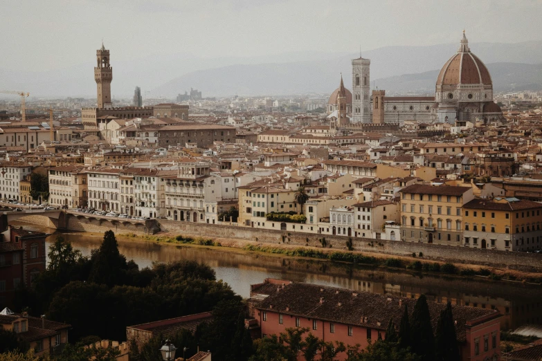 an image of city with buildings, and river