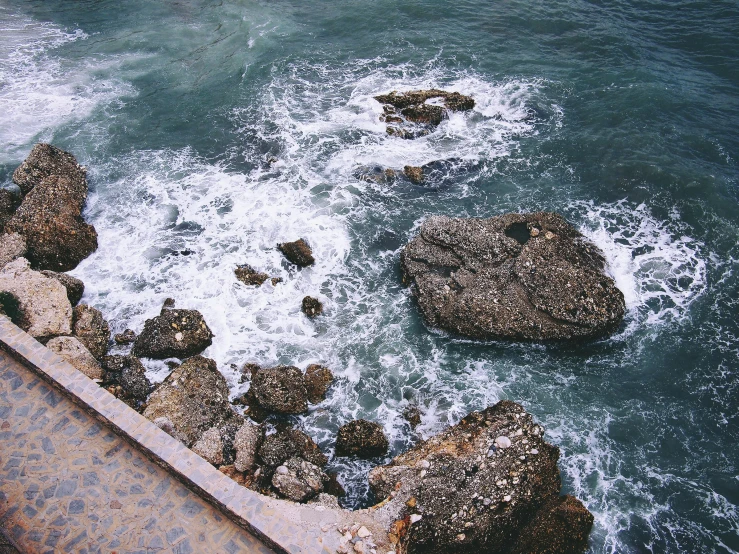 sea rocks at the edge of a body of water