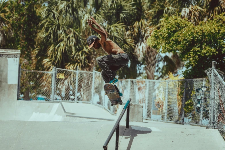 a man riding on top of a wooden ramp