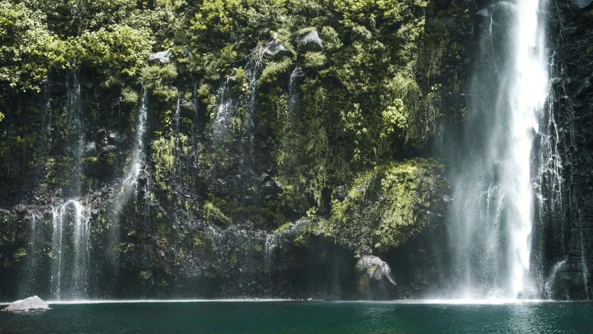 there is a large waterfall on the water