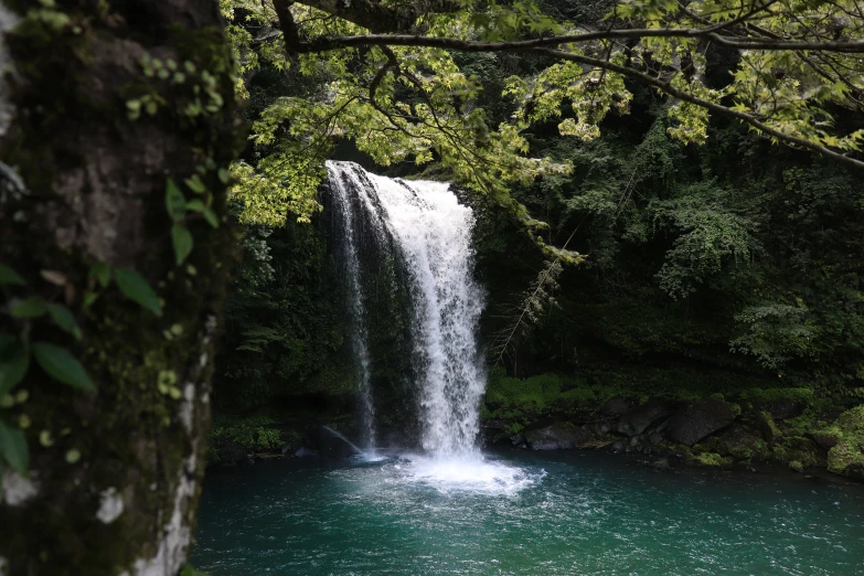 a waterfall with water pouring out of it