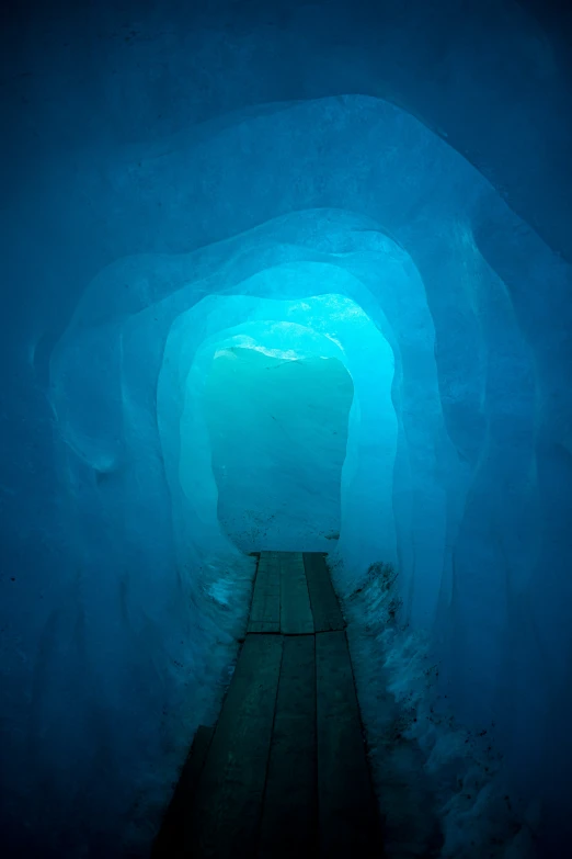 a path through an ice tunnel, in the dark