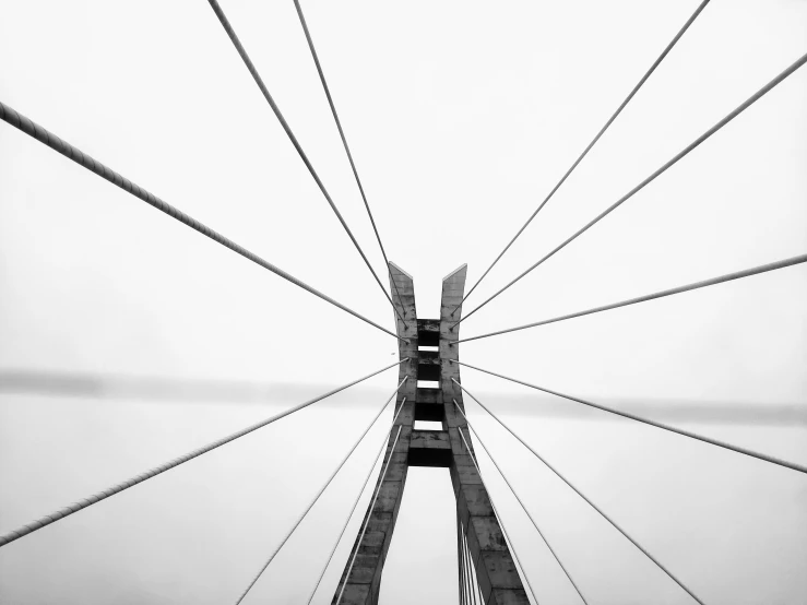 a very tall bridge on a cloudy day