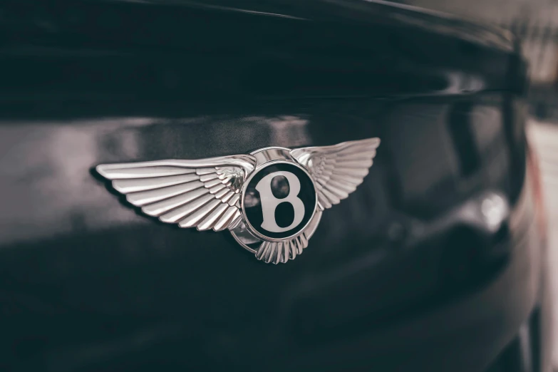 the bentley emblem is on the side of a car