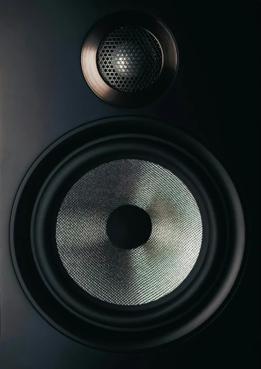 two large speakers sitting next to each other