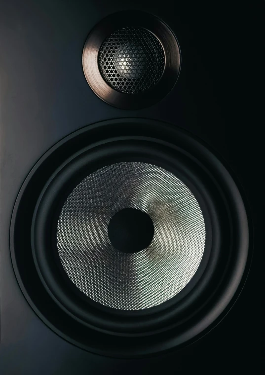 two large speakers sitting next to each other