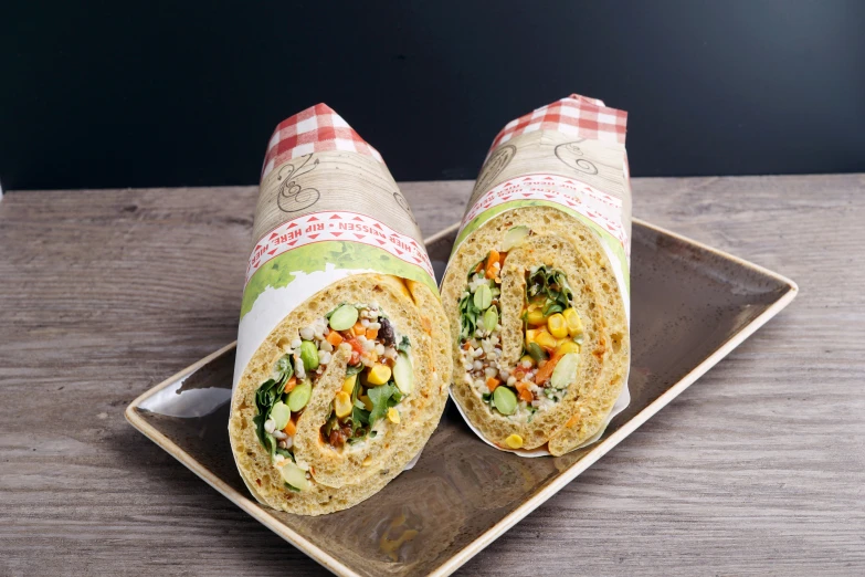 an image of food wraps sitting on a plate