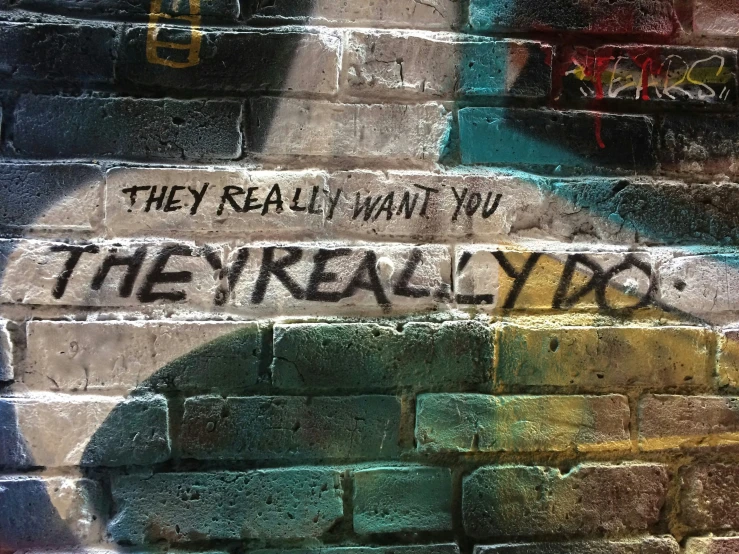 a wall has graffiti on it that reads they really do