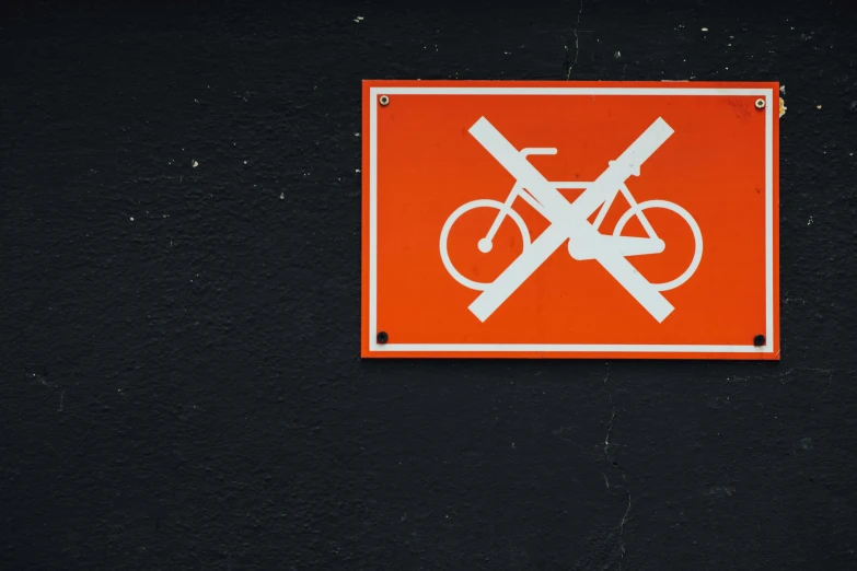 the warning sign shows bicycles are allowed to use this area