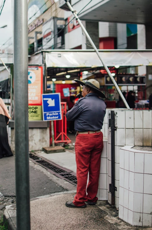 an image of a man standing in the street