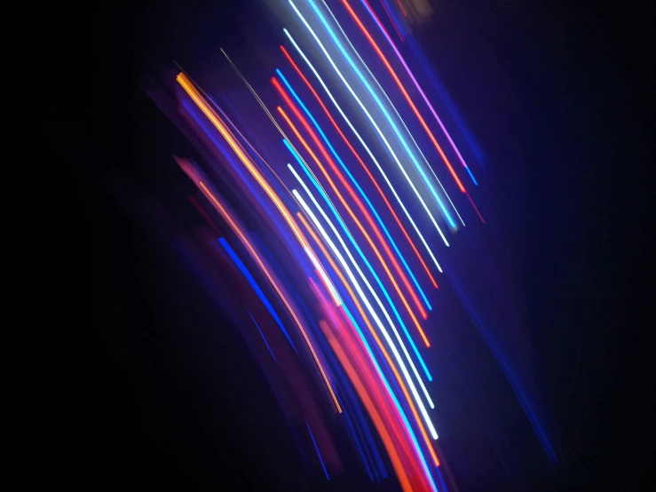 colorful lights on dark background with long exposure