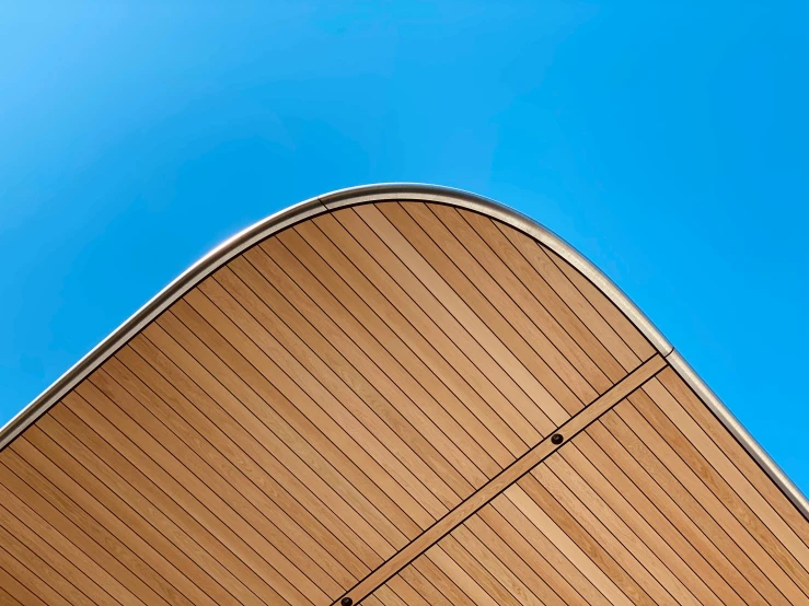 the top of a building with a sky background