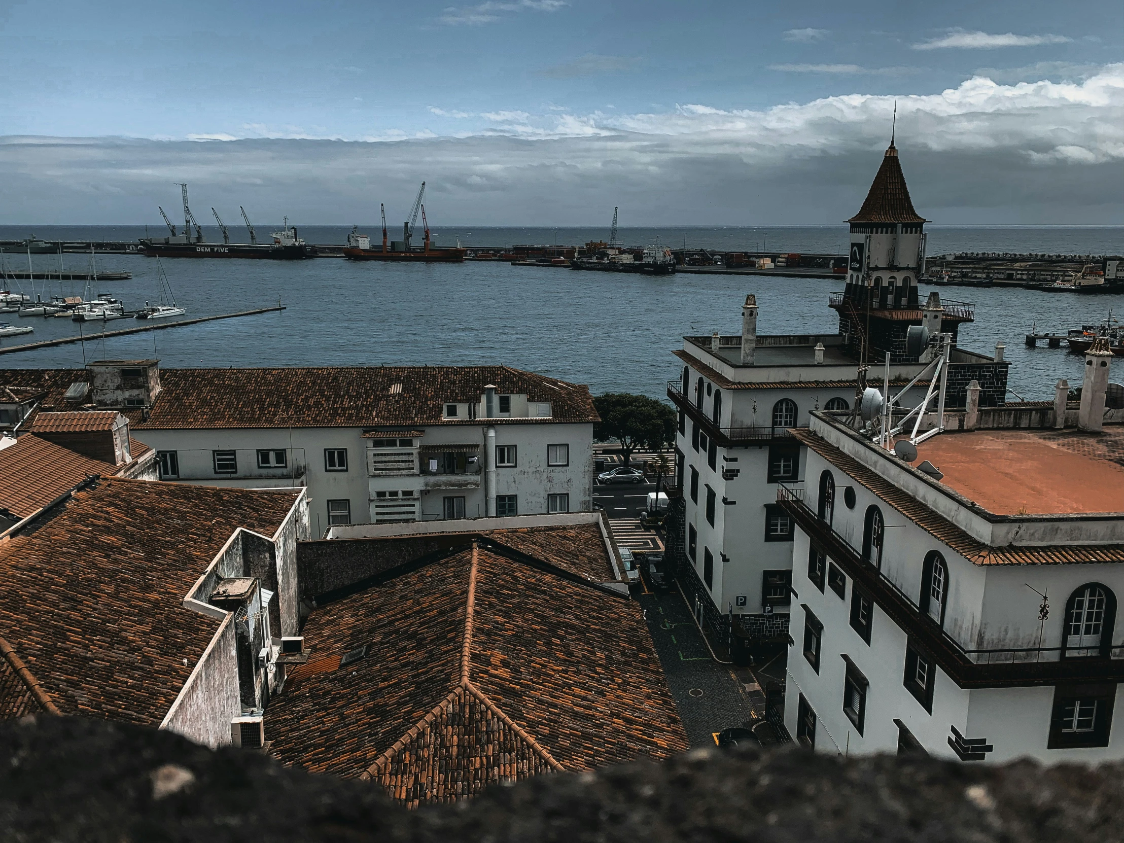 a harbor filled with boats and lots of buildings