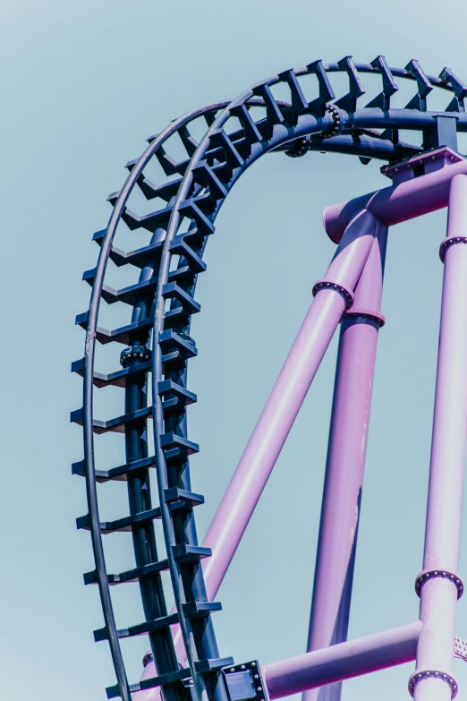 an aerial roller coaster coaster with many people on it