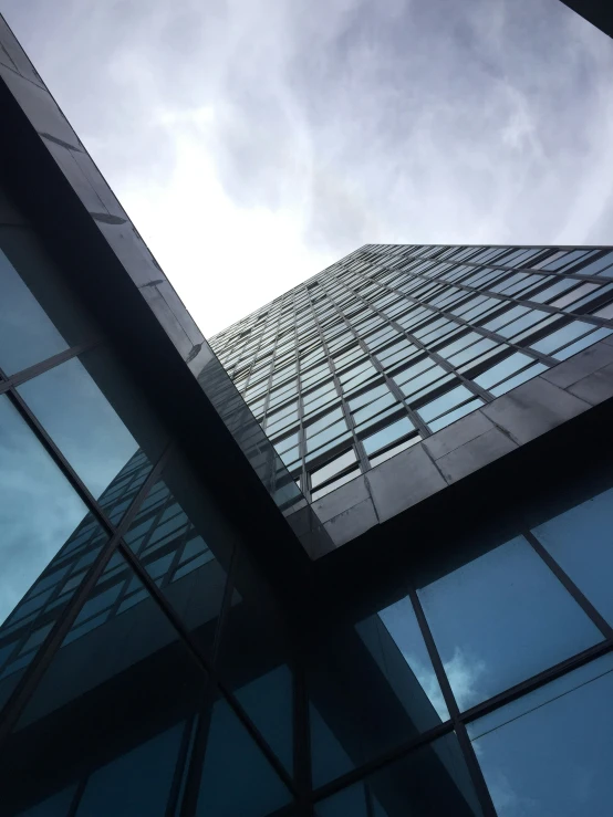 the top of a tall building with windows