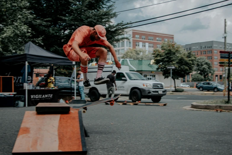 someone doing a trick on their skateboard in the street