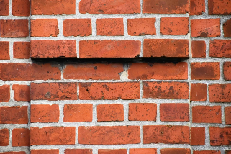 a piece of brick that is on the wall