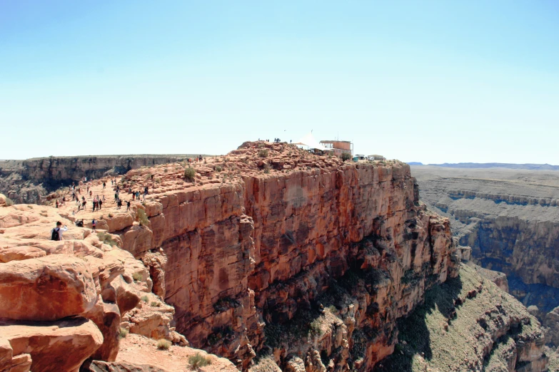 a rocky cliff near the edge of a canyon