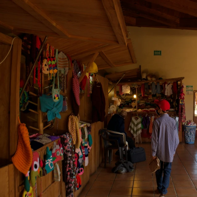 the view of people shopping inside of a shop