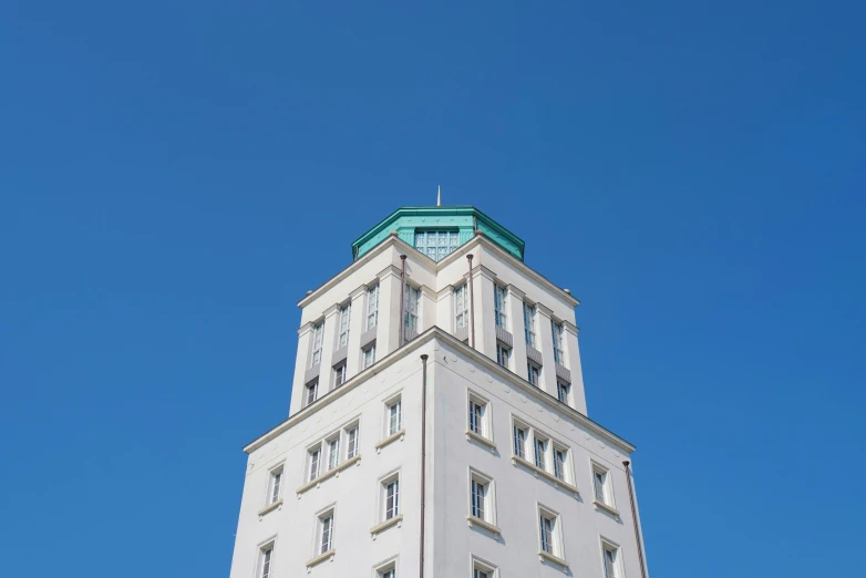 a clock is shown at the top of a tower