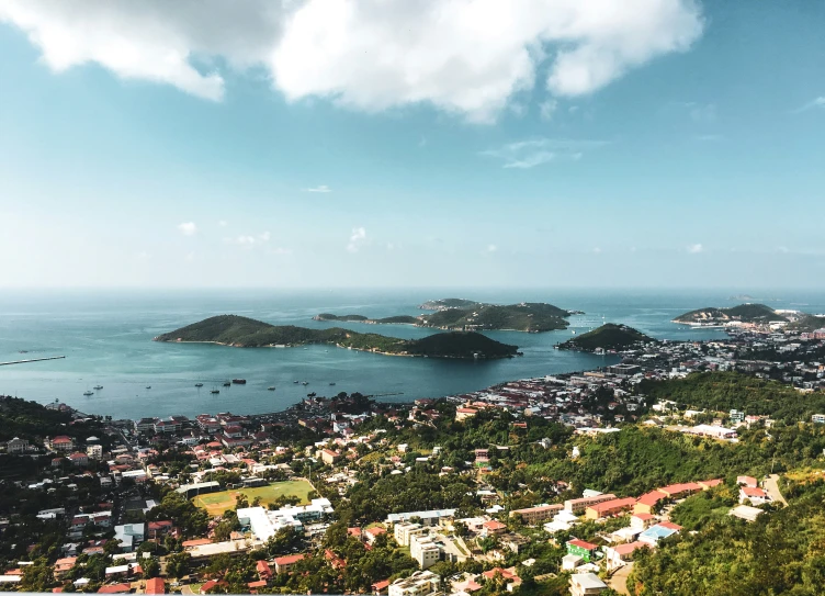 a view of a village and the ocean