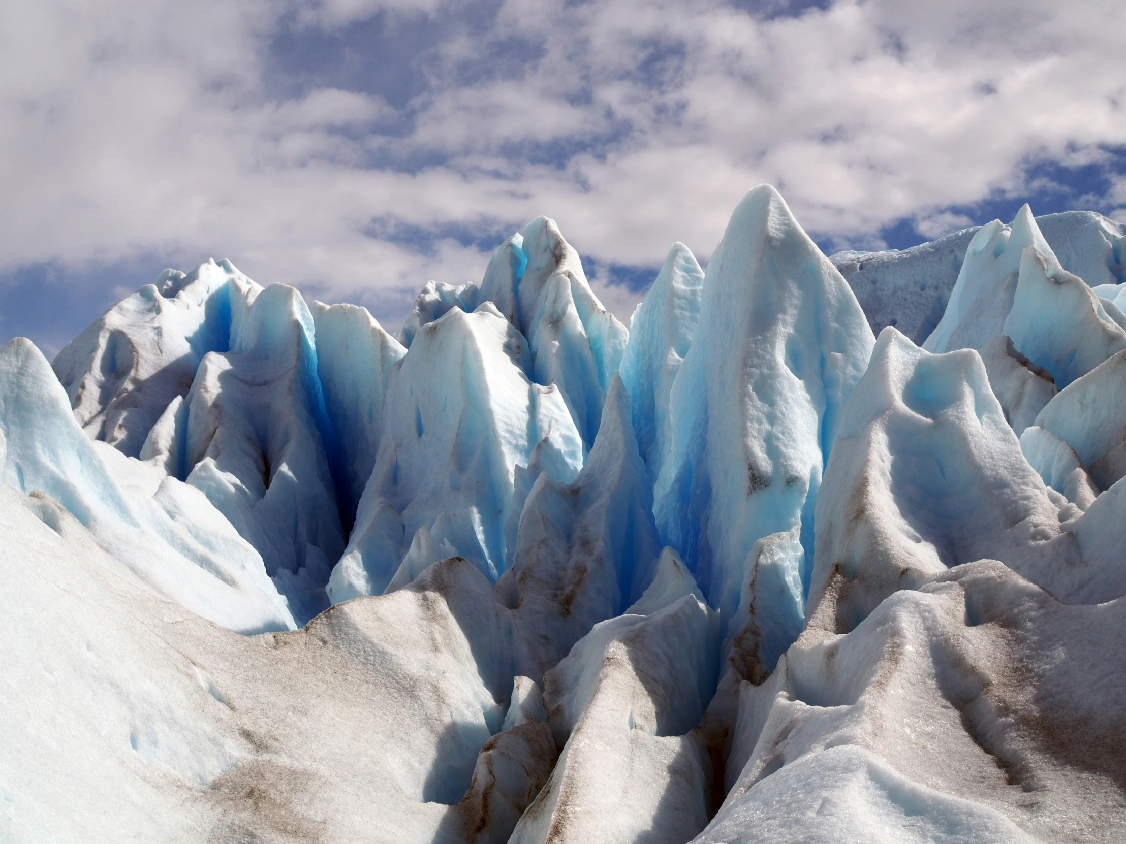 some type of blue and white rock formation