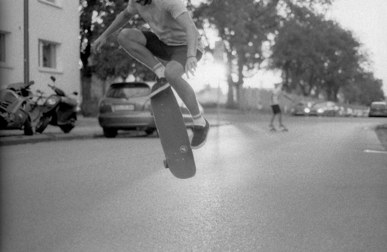 a boy in the air with his skate board