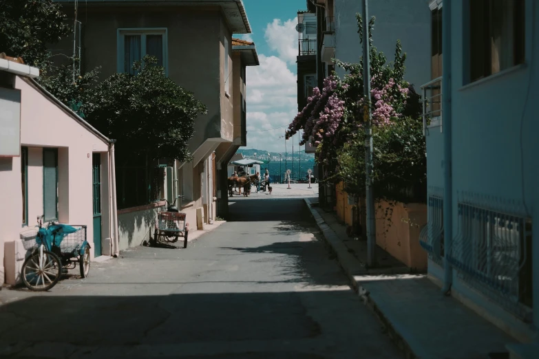 a empty road with a bike parked on the side