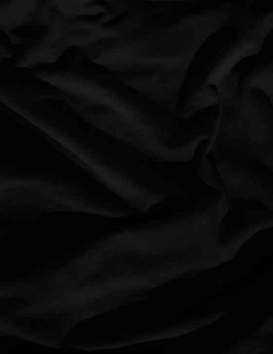an abstract po of black fabric