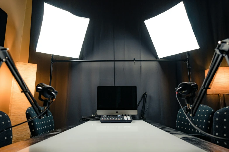 a room with several different lighting equipment set up