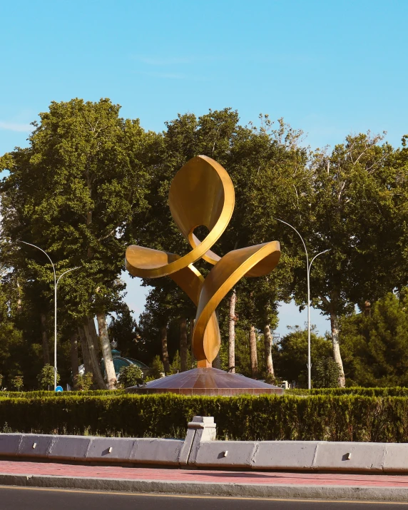 a sculpture in a park is on display