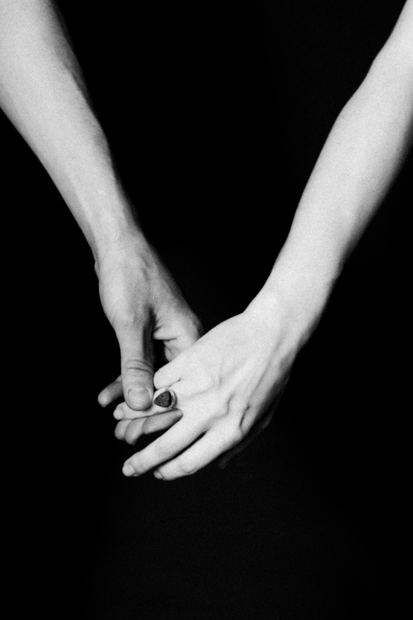 the hands of two people hold their palms