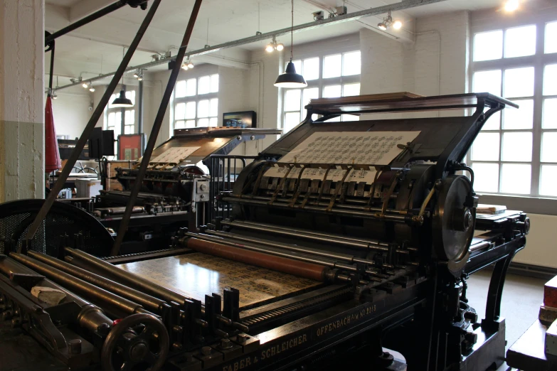 an old fashioned typewriter is being used for printing