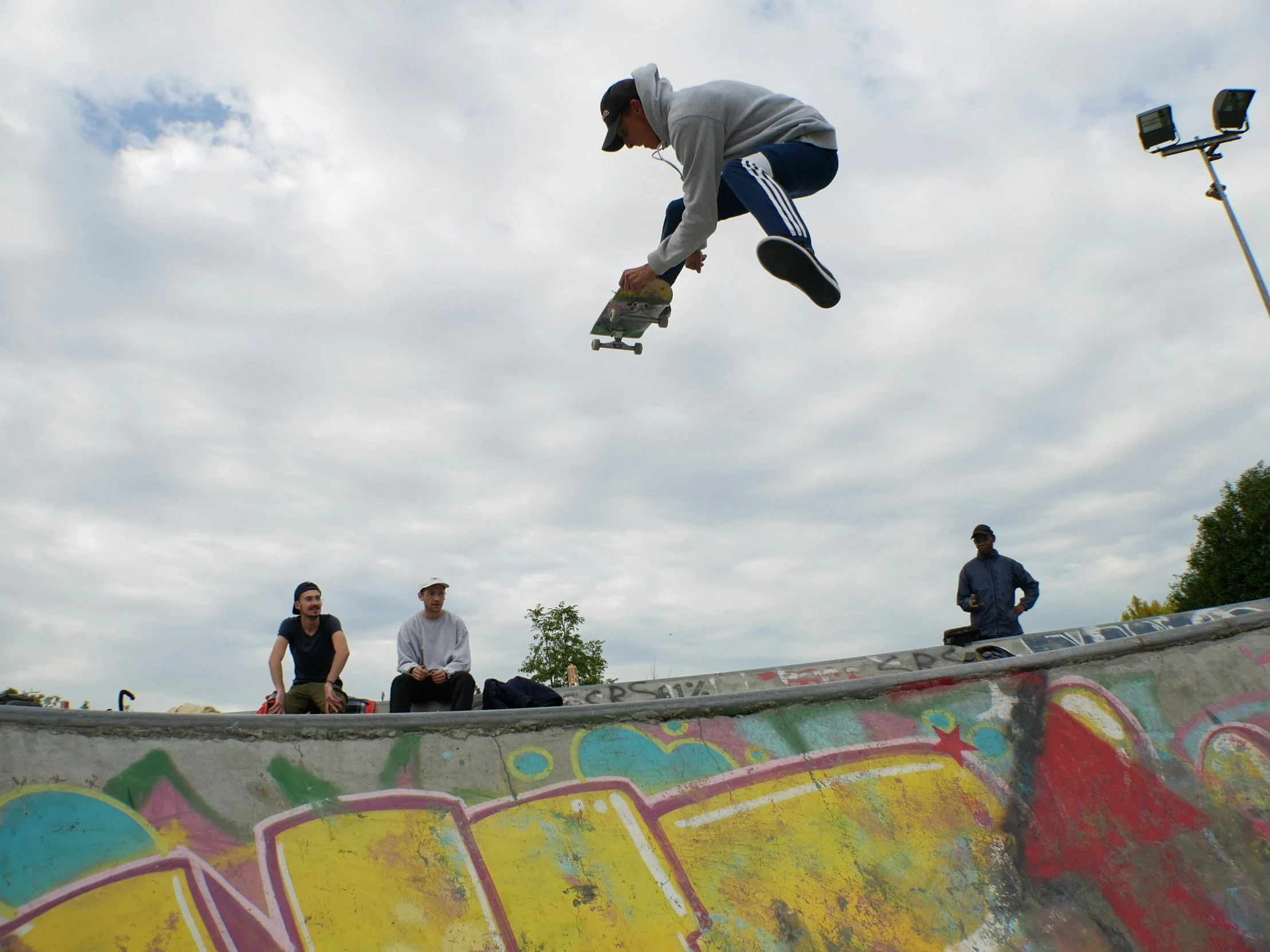 a skateboarder performs a trick in the air