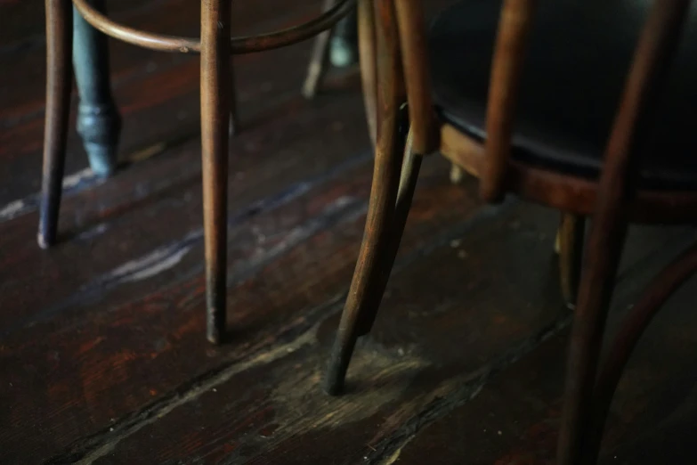 three chairs and one wooden counter top