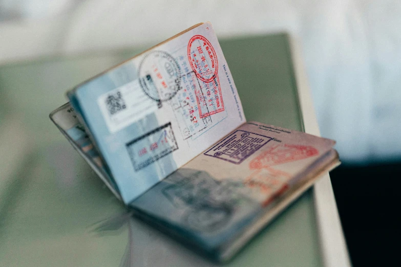 a passport being held open on a table