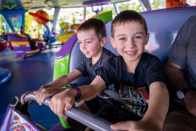 two s in a brightly colored die ride