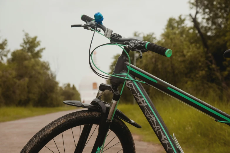 a close up view of a bicycle on a road