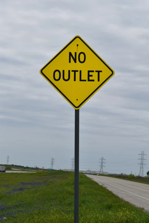 this is a sign that says no outlet