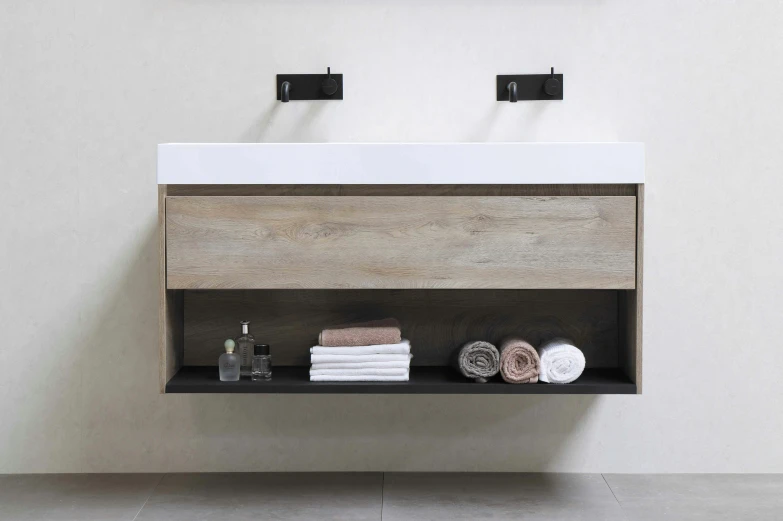 a black sink is on top of a white counter