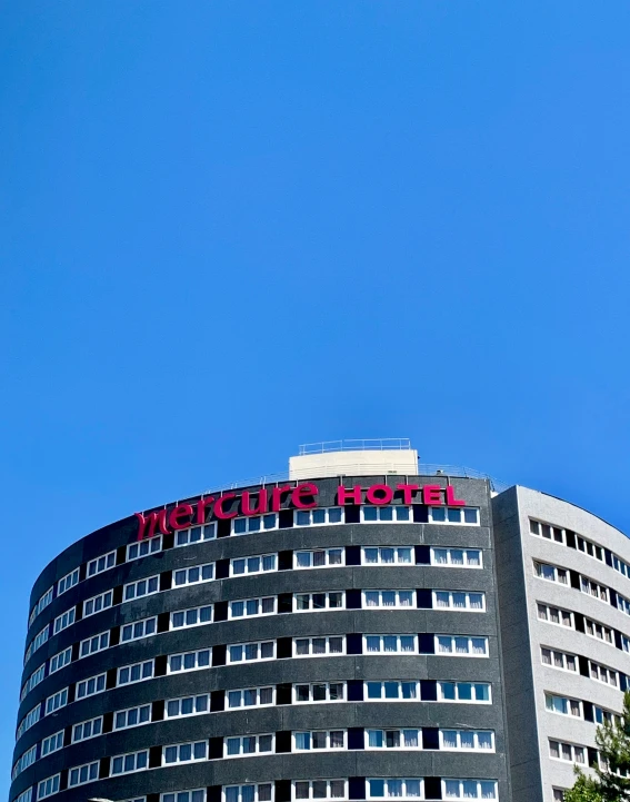 the roof of a building with an advertit on the front