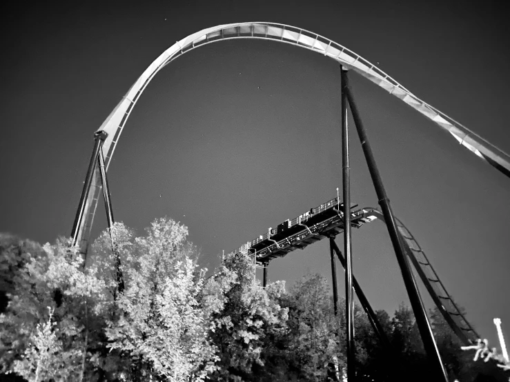 a roller coaster being lifted by a lift