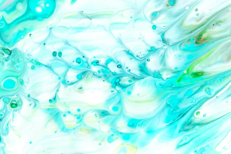 an abstract image with white and blue liquid