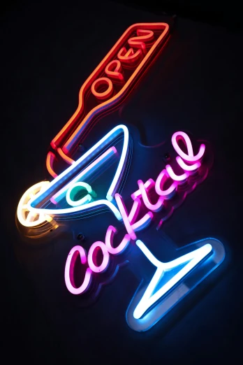 a neon sign with a cocktail glass