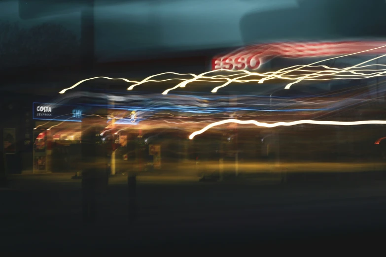 a blurry image of street lights at night