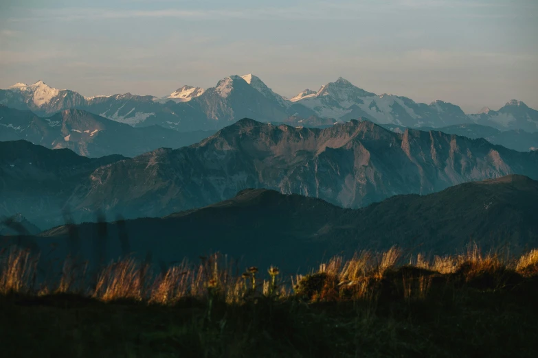 mountains covered in snow are seen in the background